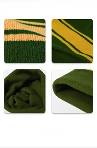 Detail of forest green and yellow striped beanie showing rib-knit texture and stitching