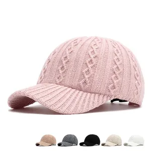 Pink knitted cable knit baseball cap with multiple color options for winter warmth