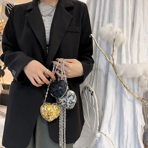 Sparkly heart shaped sequin evening bags in black, silver, and gold with chain strap