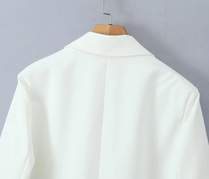 Back view of a white professional blazer with center seam detail and polyester blend fabric