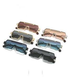 Detail of futuristic punk sunglasses with geometric frames and double bridge structure