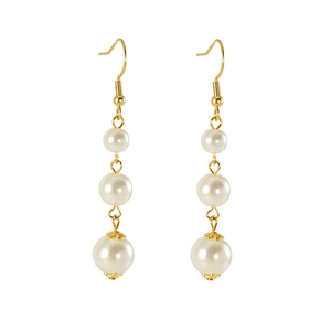 Elegant gold drop earrings featuring three graduated pearls in a vertical hanging design