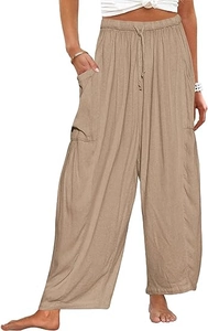 Détail du pantalon harem kaki clair avec taille élastique à cordon et texture lin