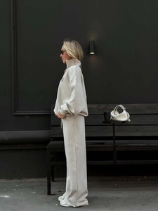 Women's minimalist two-piece oatmeal tracksuit with half-zip sweatshirt and wide-leg pants