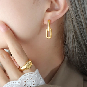 Retro Thai style interlocking gold earrings and textured chunky ring set for women