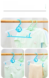 Detail of baby hanger hooks for pajamas and scarves with thick material and bear icon