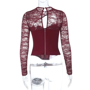 Detail of dark red lace bodysuit showing back view with intricate textures and zipper