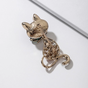 Detailed back view of a cute fox brooch with hollow patterns and a secure pin clasp