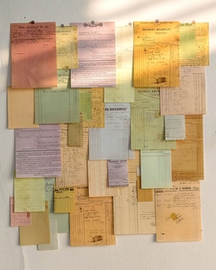 Macro shot of vintage scrapbooking paper texture with aged receipt and ticket designs