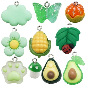 Colorful resin charms set featuring butterfly, avocado, and cat paw for DIY jewelry making