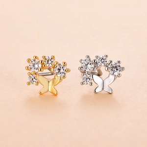 Surgical stainless steel L-shaped nose stud featuring cubic zirconia butterfly design