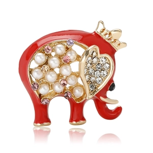 Cartoon enamel elephant brooch with red finish, pearls and crystals on white background