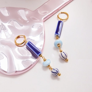 Elegant vintage blue ceramic tassel earrings with gold-tone stainless steel hooks