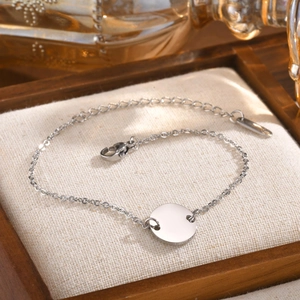 Elegant silver stainless steel chain bracelet with a round blank pendant for DIY engraving