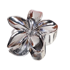 Sleek silver metal flower hair claw clip with a polished finish on white background