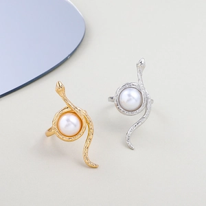 Bohemian gold and silver snake wrap rings with pearl inlay and detailed scales textures