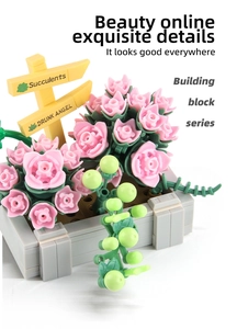 Detailed macro view of pink succulent building blocks in a gray pot with signpost