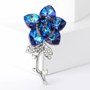 Elegant luxury blue crystal flower brooch with silver metal leaves and sparkling rhinestones