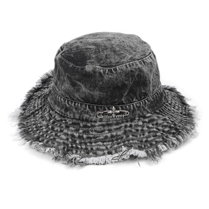 Vintage acid-washed black denim bucket hat with frayed edges and silver pin detail
