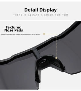 Close-up of ergonomic integrated nose pads on professional cycling sunglasses for comfort