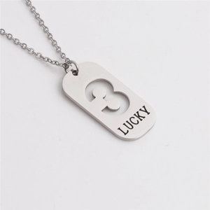 Detail of silver titanium steel necklace with a hollow number 3 pendant and Lucky engraving