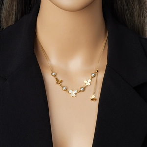 Golden Y-shaped stainless steel necklace with butterfly shell pendant and pearls for women