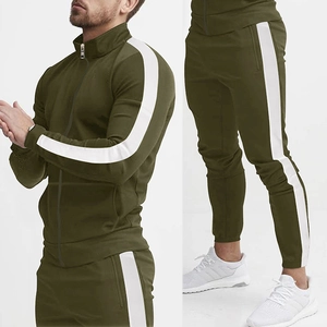 Detail of army green tracksuit showing white side stripes and stand collar craftsmanship