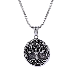 Vintage silver tree of life stainless steel pendant shown on white background