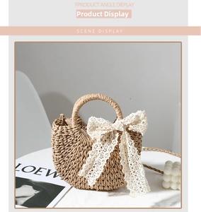 Detailed shot of handmade straw bag with lace bow and woven shoulder strap on a table