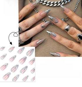 Detail showing 3D silver liquid metal patterns on short almond-shaped press-on nails