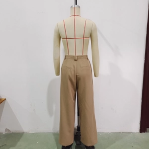 Back view of high-waisted wide-leg khaki trousers with pocket detailing on a mannequin