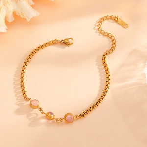 18k gold plated stainless steel bracelet featuring three elegant pink round beads