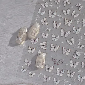 Détail des stickers ongles MS 573 ultra-fins avec papillons brillants et bords métalliques