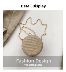 Detailed view of the gold glitter spherical evening clutch with a metallic chain strap