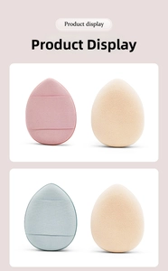 Detailed view of teardrop finger puffs showing dual-sided sponge and mesh texture