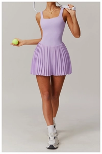 Detail of lavender pleated tennis dress with moisture-wicking fabric and U-neckline