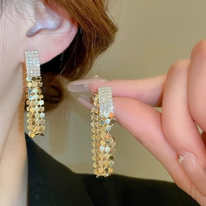 Elegant gold fringe earrings with sparkling rhinestones and metallic sequin tassels for women