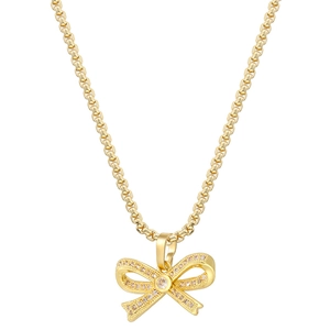 Elegant gold bow pendant necklace with sparkling zircons on a delicate chain