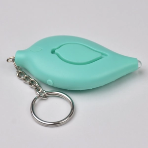 Leaf-shaped mint green personal alarm with plastic casing and metal keychain attachment