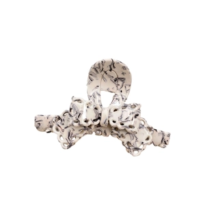Bow-shaped marble acetate hair claw clip with sweet lace-inspired cutout patterns