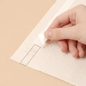 Disposable waterproof food-grade placemat for babies with adhesive strips for secure fixing
