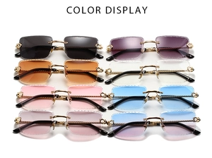 Detail of rimless square sunglasses with gold twisted metal temples in multiple colors