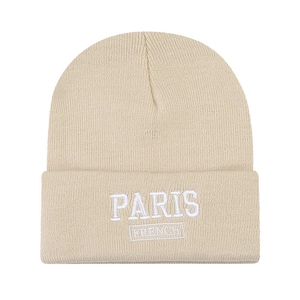 Chic beige oversized knit beanie with Paris embroidery for a street style look