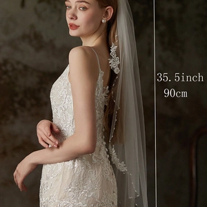 Detail showing 90cm bridal veil with delicate floral lace appliques and beadwork