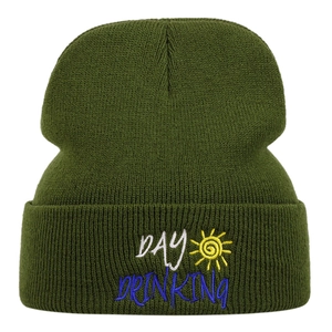 Olive green knitted beanie with Day Drinking embroidery and yellow sun graphic