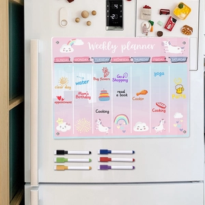 Magnetic weekly planner on fridge with six colorful markers and cute unicorn design