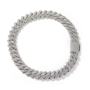 Detailed macro view of 20mm silver Cuban chain with dense zircon stones and clasp lock
