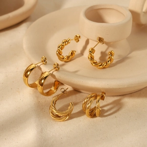 Three pairs of 18K gold plated C-shaped twisted and smooth titanium steel hoop earrings
