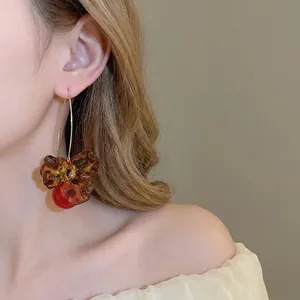 Vintage acrylic flower and red pearl drop earrings with leopard pattern for women