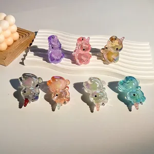 Colorful acrylic unicorn charms with iridescent glitter finish for DIY jewelry and keychains